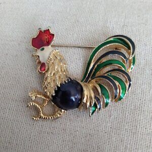 Multi color rooster brooch.